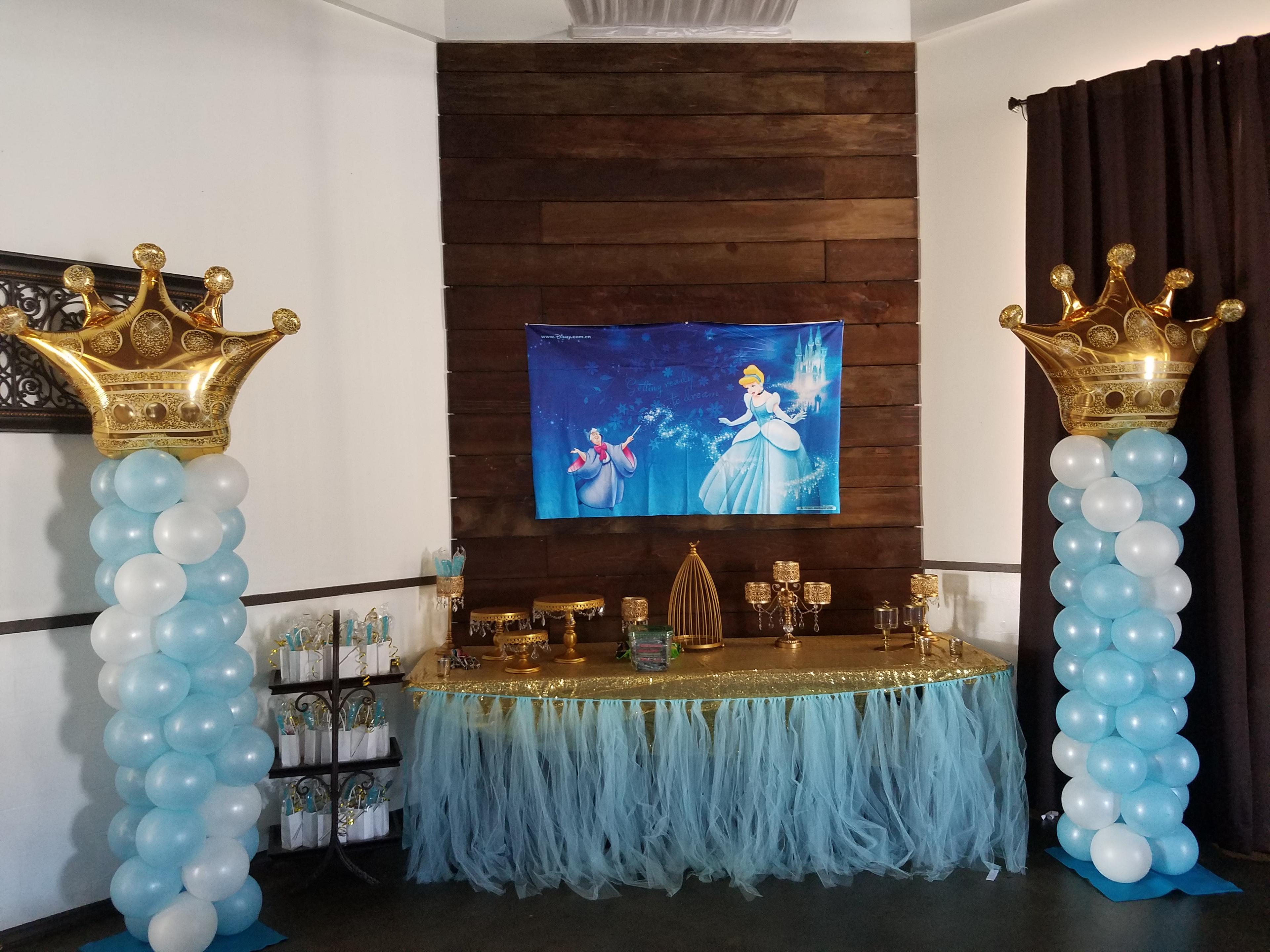 Cinderella themed display with balloons on the side